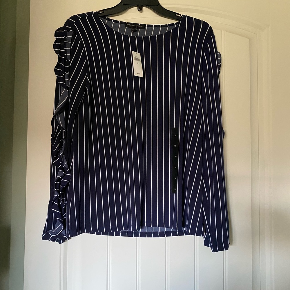 Navy stripe Banana Republic blouse. Ruffled sleeves with peek a boo openings